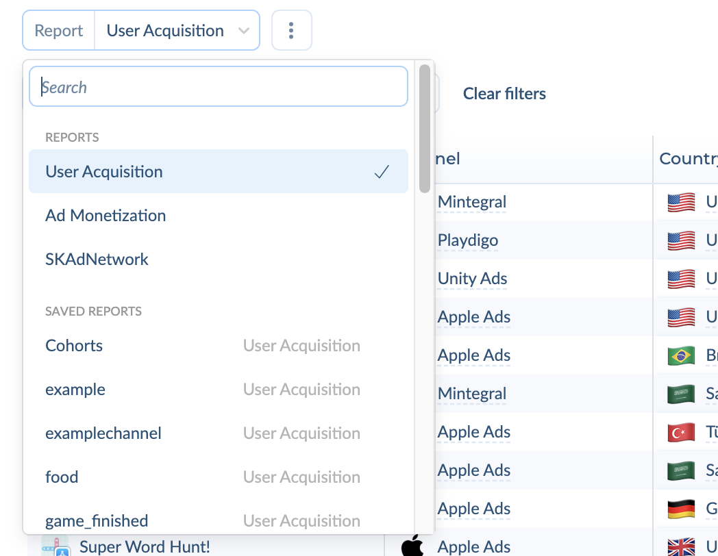 Report dropdown listing User Acquisition, Ad Monetization, SKAdNetwork and saved reports